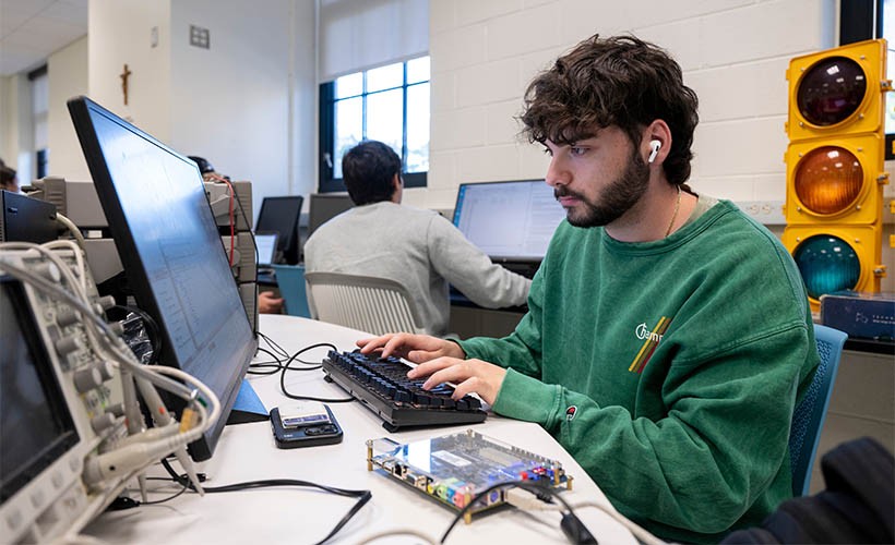 Bachelor of Science in Electrical Engineering A student works on a project at a computer
