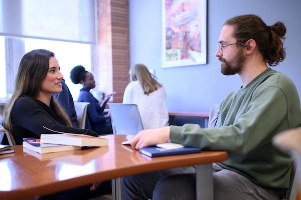 Students-talking-in-writing-Center Two students in conversation in the Writing Center.