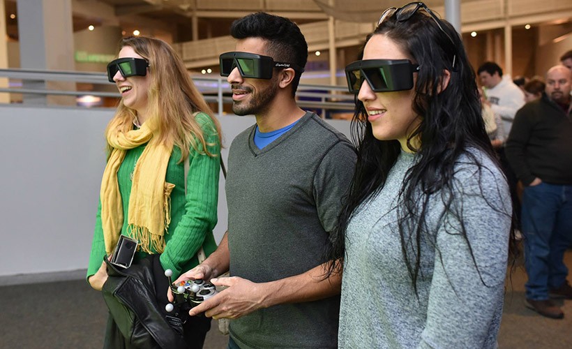 Students using virtual reality googles. Students using virtual reality googles.