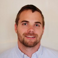 A man smiling at the camera