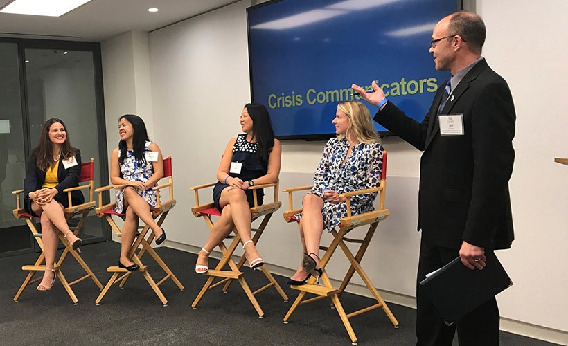image of faculty member leading an alumni panel.