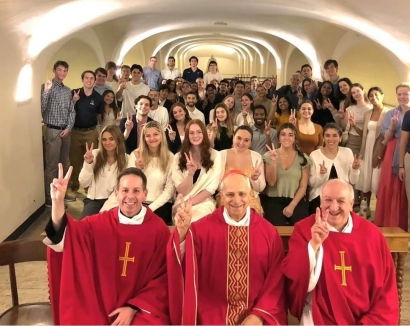 A  group of Villanova students, faculty and staff celebrated Mass with Pope Leo, then Cardinal Prevost, at the Vatican in Fall 2024. The Rev. Kevin DePrinzio, vice president of Mission and Ministry (front, left) sits next to his longtime friend. 