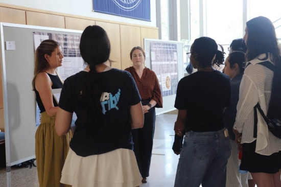 undergrad-nursing-scholars A student giving a presentation to a group of people