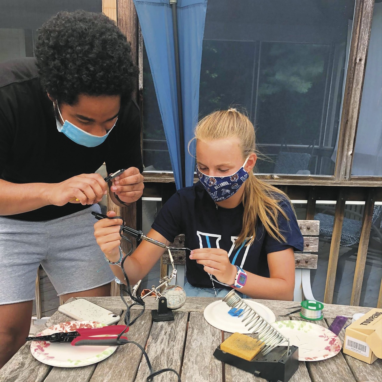 Cesar Nunez Rodriguez and Anna Staiger working together Students working together to design a treatment for infant health