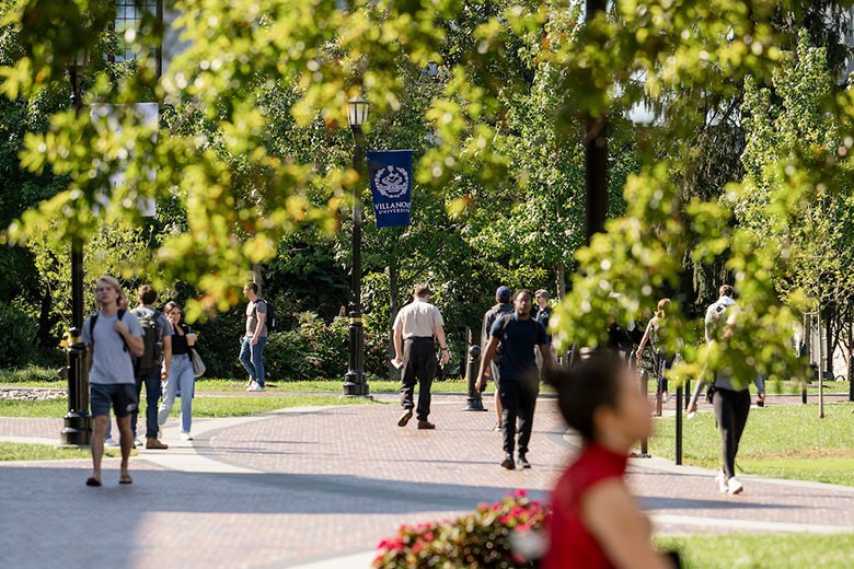 campus-scene-people-walking People walking on campus