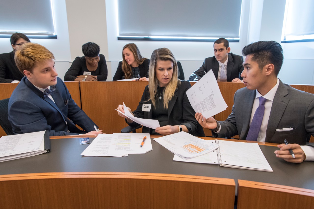 Law students working together in a classroom 