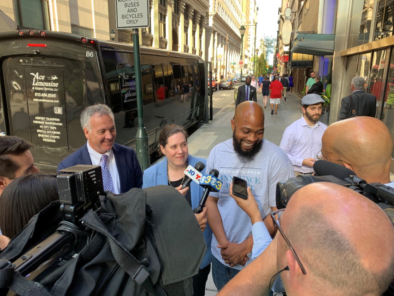 JohnMillerLegalTeal Tom Gallagher, Hannah McPhelin and John Miller, a free man.