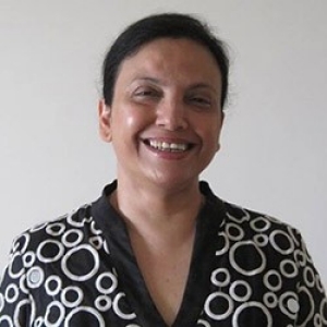 Raka-Shome-web headshot of raka shome