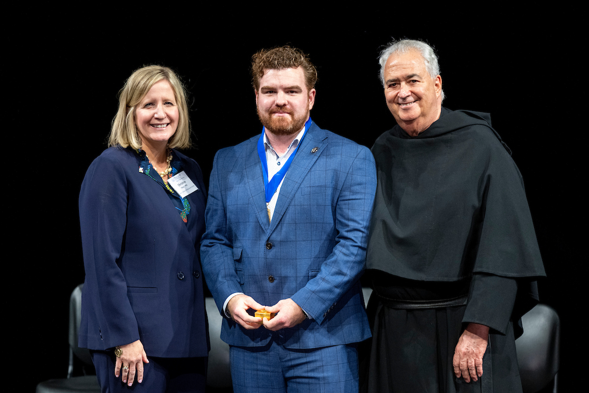 Matthew Keen with Dean Palus and Father Peter Donohue
