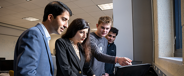 Image of a Villanova faculty member providing instruction to students.